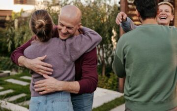 People hugging each other as a greeting